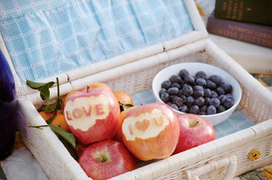 Fruity Engagement Session with Carved Apples and Vintage Charm