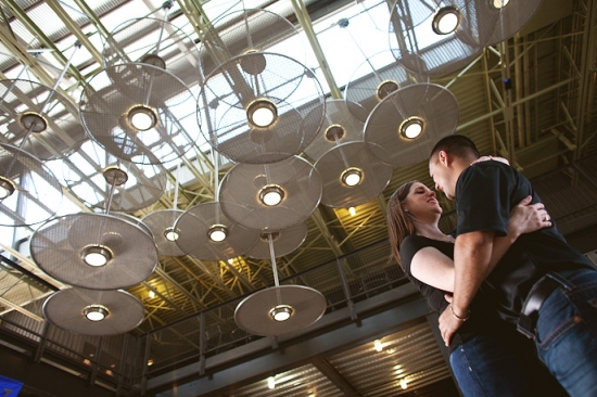 Couple's Romantic Embrace Under Unique Lights