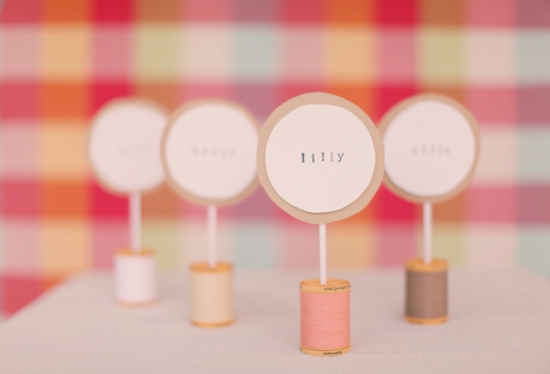 DIY Wedding Place Cards: Thread Spools & Lollipop Sticks