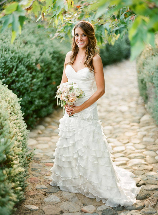 Bride in white dress at Maison des Oliviers wedding venue, CA