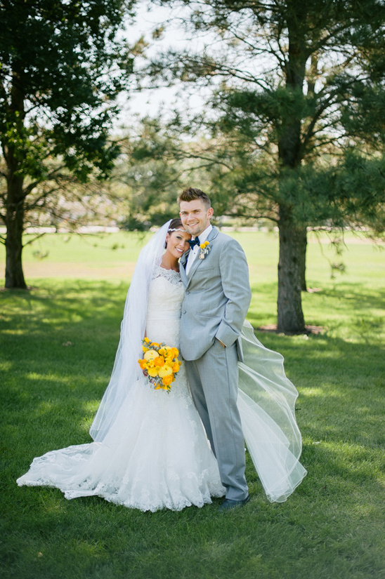 Rustic Elegance: A South Dakota Wedding with Navy and Yellow Decor