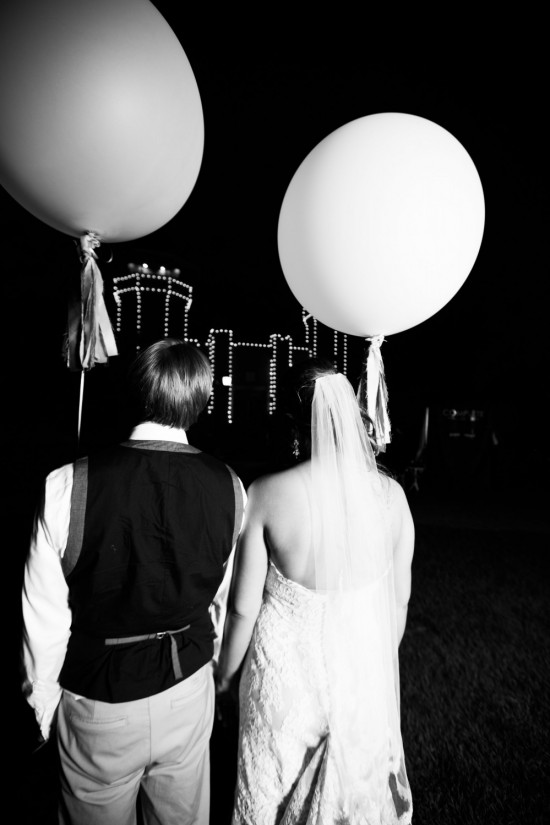 Romantic wedding night with balloons, dress, flowers, and photography