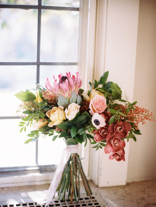Stunning Bouquet: Garden Roses, Orchids, and Protea for Your Big Day!