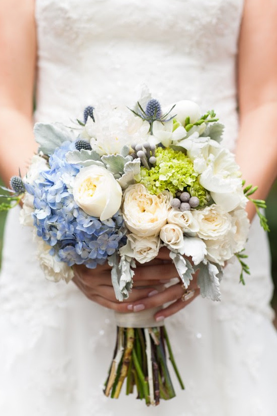 Bride with Roses Hydrangea Bouquet by Charlotte Wedding Photographer