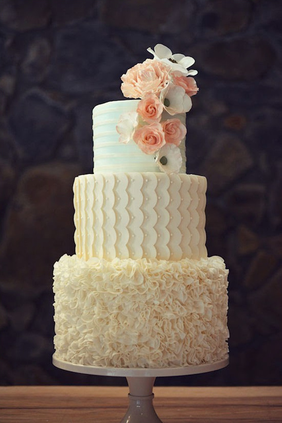 Elegant tiered wedding cake with floral details from Country Cake Shop