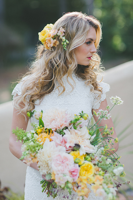 Elegant bride with floral hair and bouquet by E Events Co