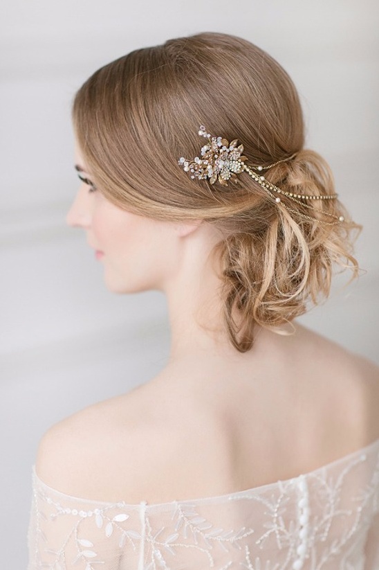 Elegant Bride with Bejeweled Hair Accessory and Wedding Dress