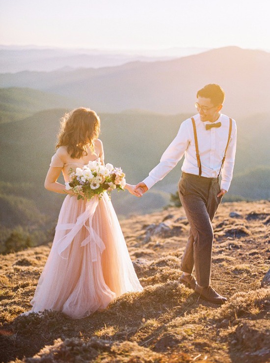 Romantic wedding photos on a mountain at sunset by Alexandra Grace