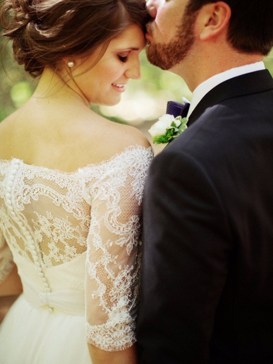 Bride and Groom's Kiss: Romantic Wedding Photo by Ryan Flynn