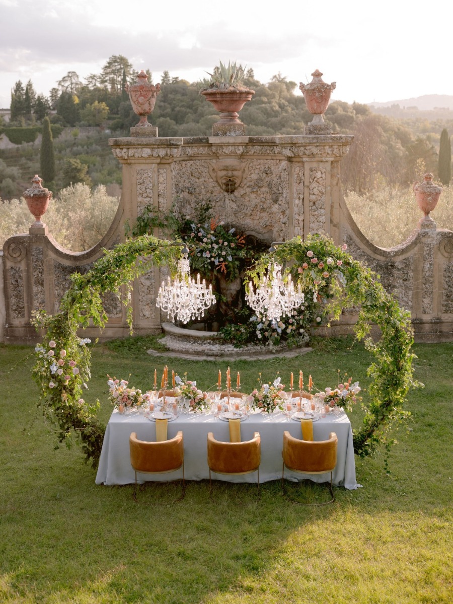 Sunset Magic: Tuscan Wedding with Floral Glamour & Chandeliers
