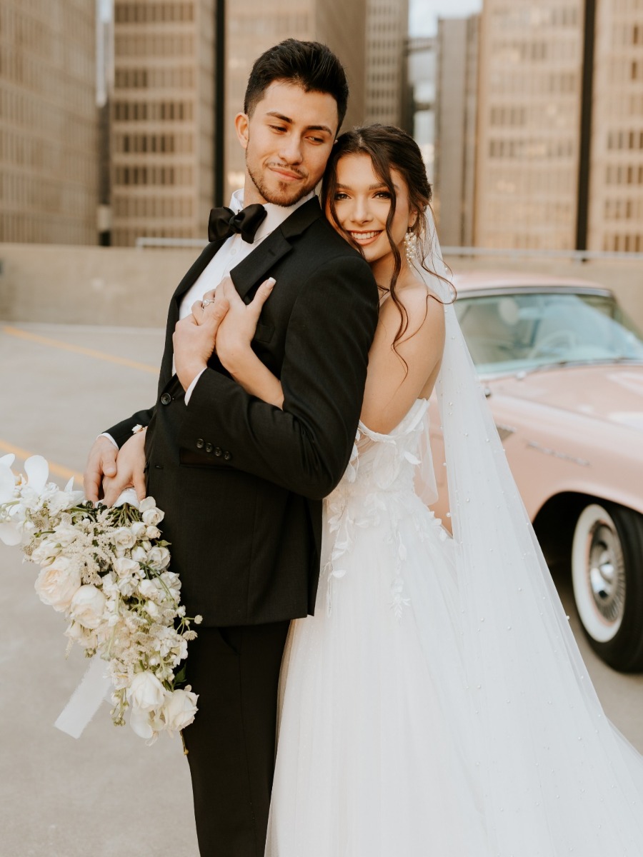 Romantic Atlanta Rooftop Elopement with Classic Pink Car