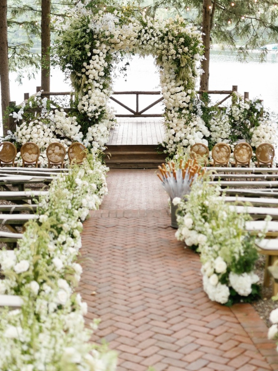 The guests all wore black to this chic monochromatic lakeside wedding