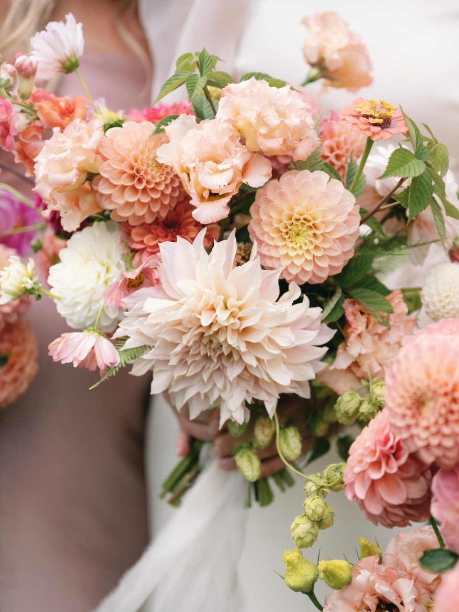 Pastel florals framed this mountainous evergreen backdrop