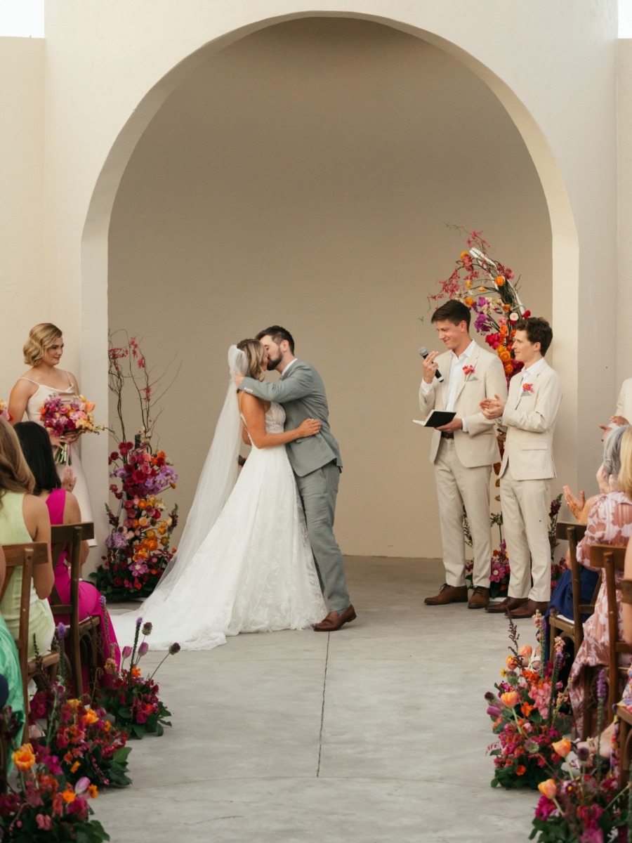 Their dog made it on the dance floor at this colorful Cabo wedding