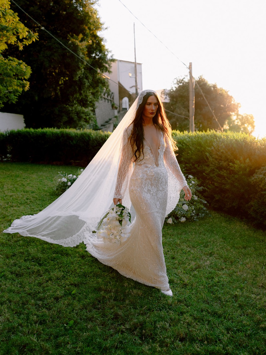 This bride channeled 70s elegance for her amalfi coast wedding in a winged gown by Galia Lahav.