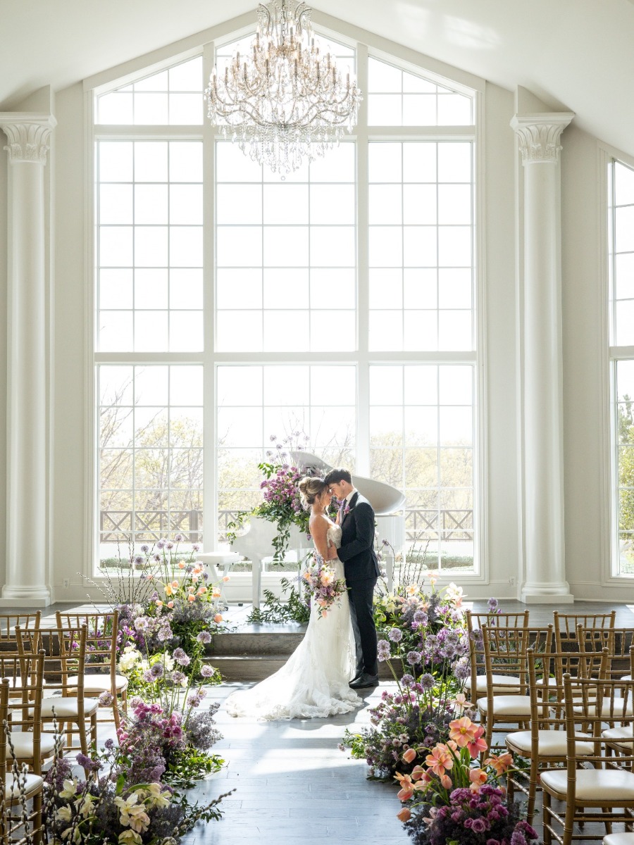 French lavender wedding with luxurious oversized floral installations