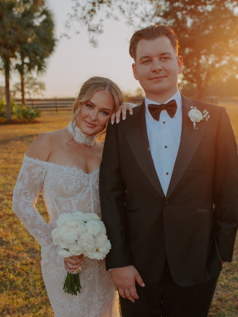 Black tie draped wedding at the bride's family horse farm