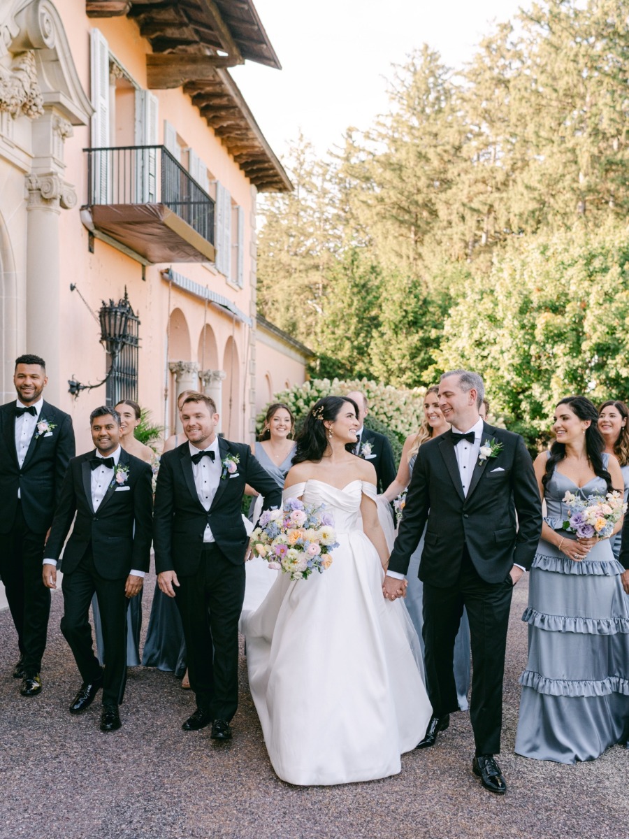 You might recognize the cinematic pink mansion from this wedding