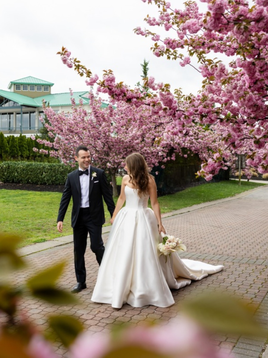 And just like that, a rainbow arched over this NYC wedding