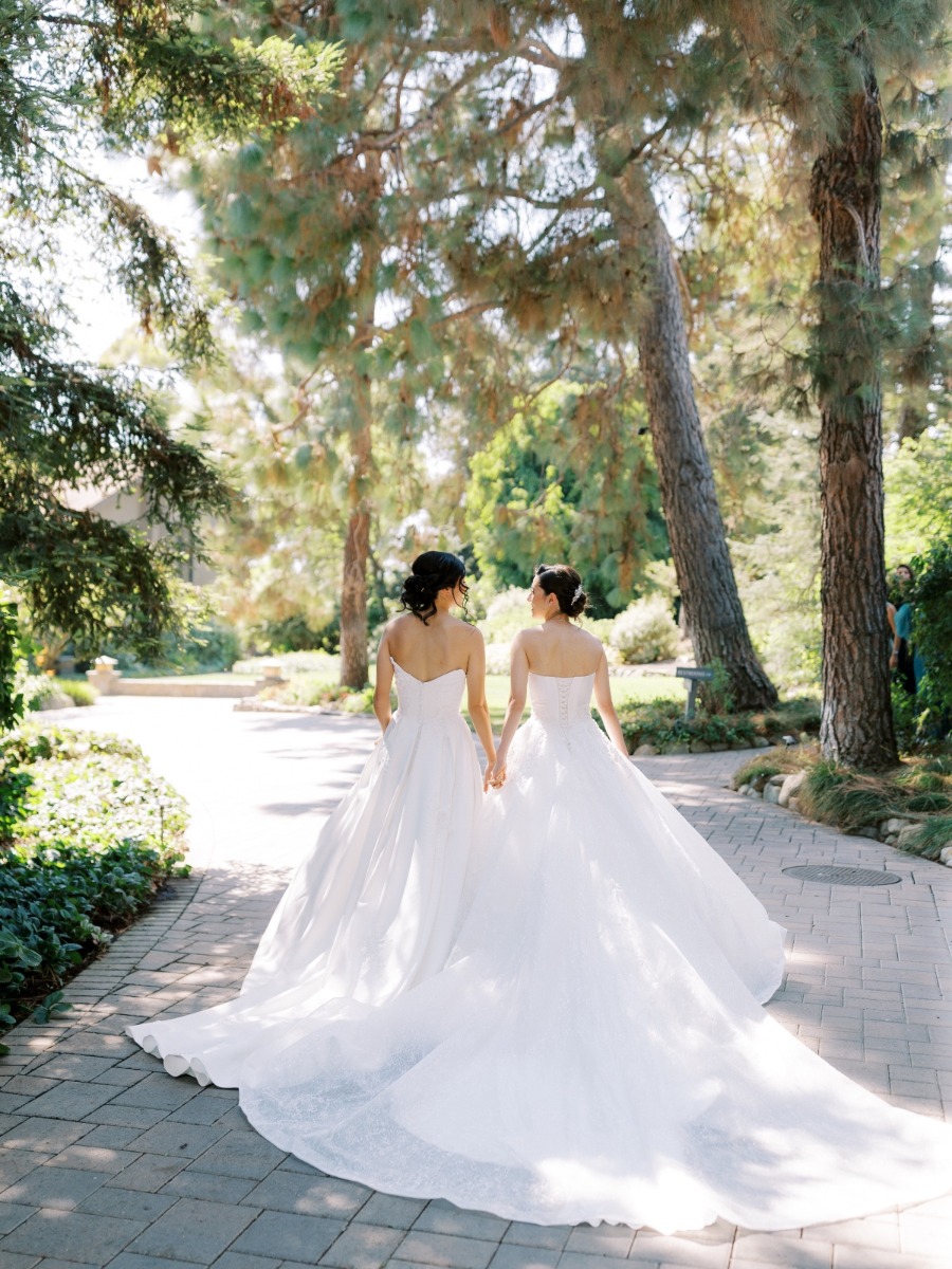 These brides said I do at a white and teal California garden wedding