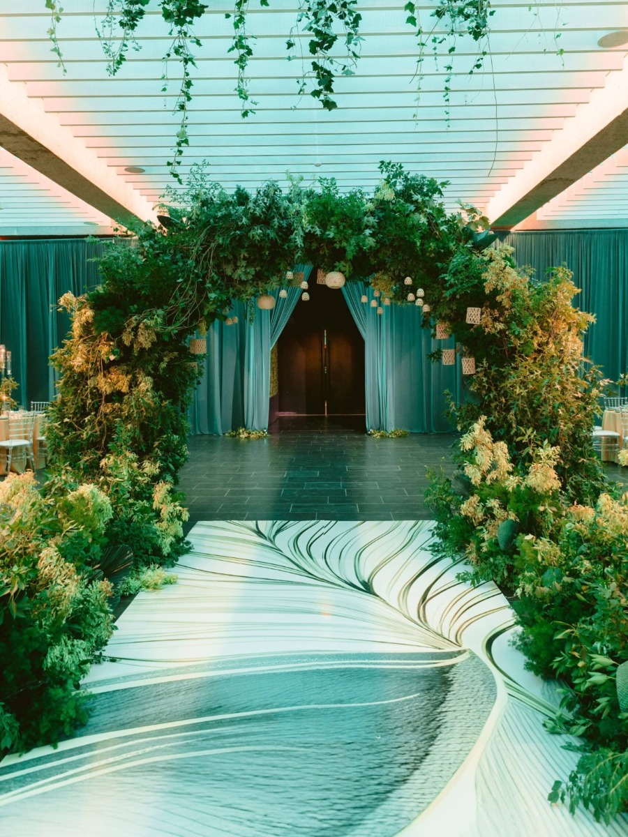 Vibrant blue-green Nigerian wedding with enchanted garden aesthetic