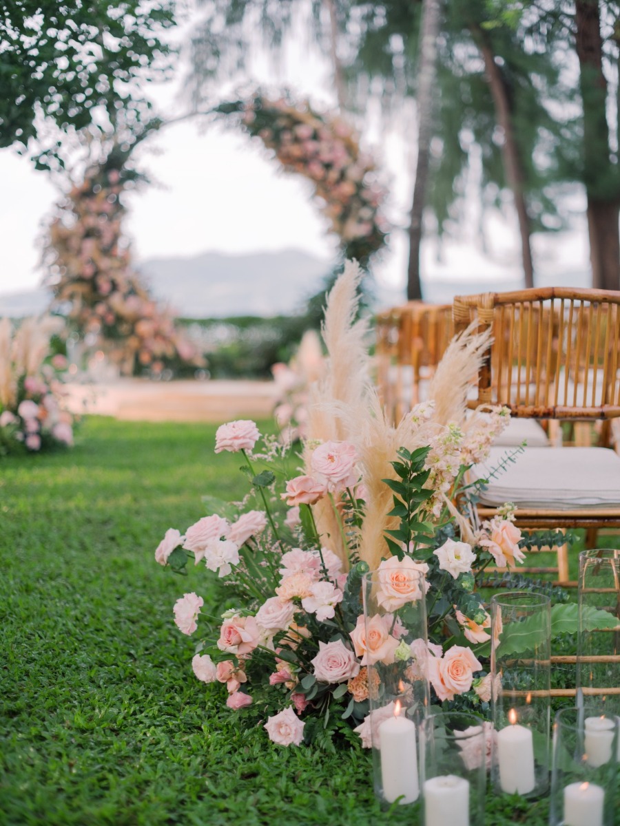 Peach-hued beachfront wedding at rosewood in phuket