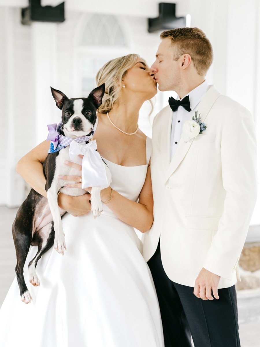 The bride released butterflies at this hydrangea & rose garden wedding