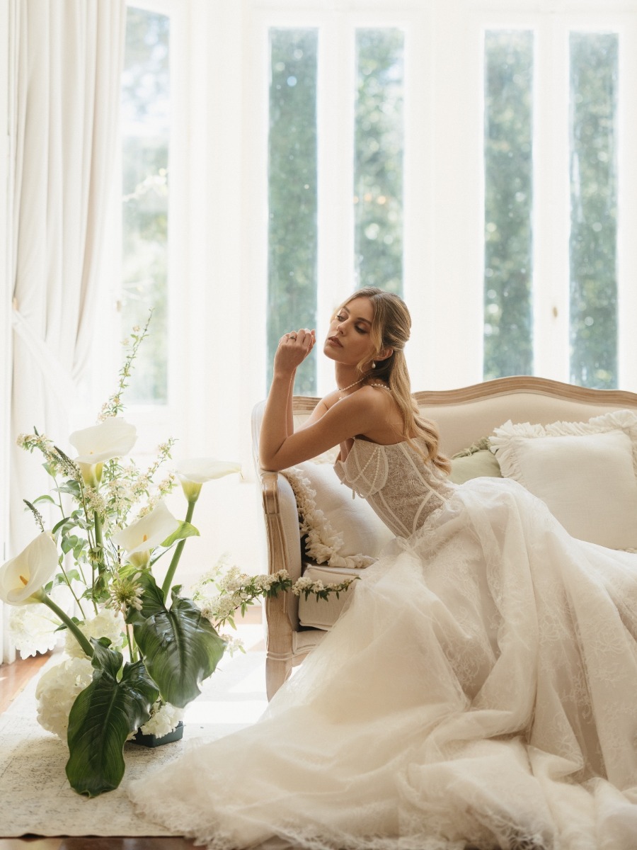 Luxe garden wedding with an organic lily-inspired ground installation