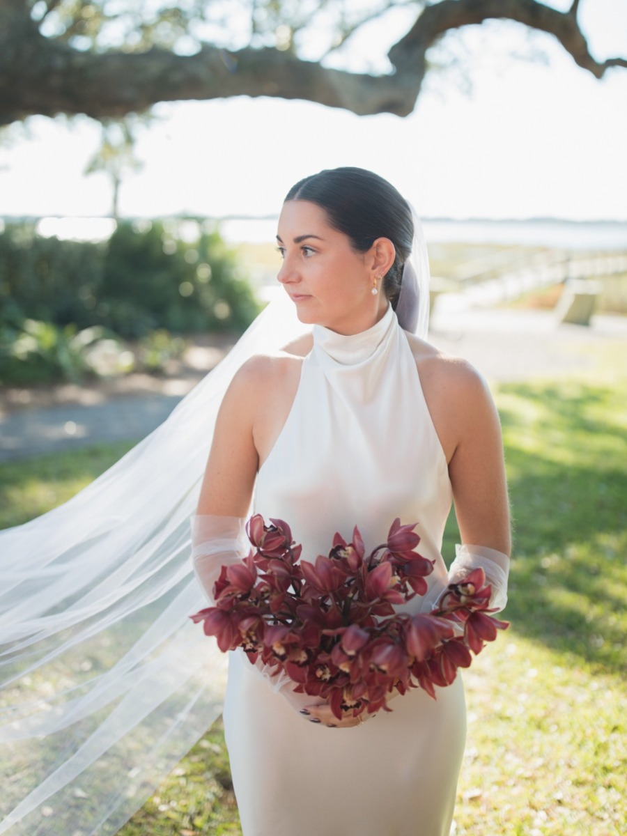 Outdoor wedding with moody fall florals and effortlessly chic fashion