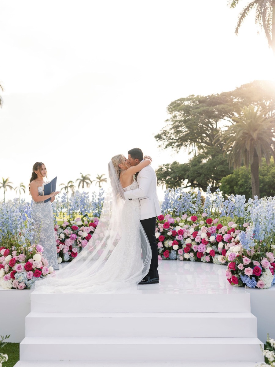Palm Beach waterfront wedding in clouds of magenta and cerulean blue