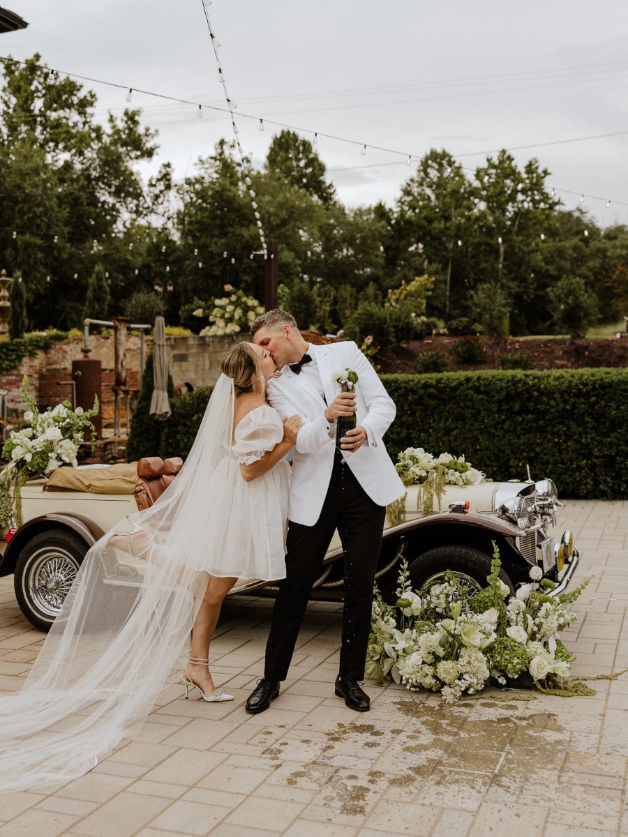 Elevated green and white wedding literally draped in Southern charm