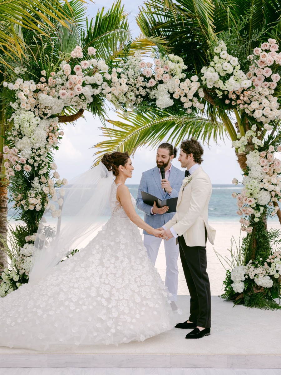 Romantic coastal wedding in pink that was almost as white as the sand