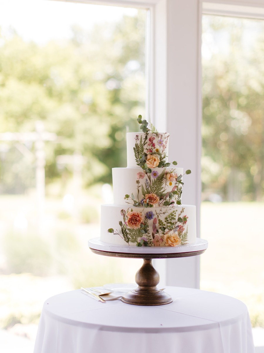 A summer wedding with the perfect peach and sage color palette