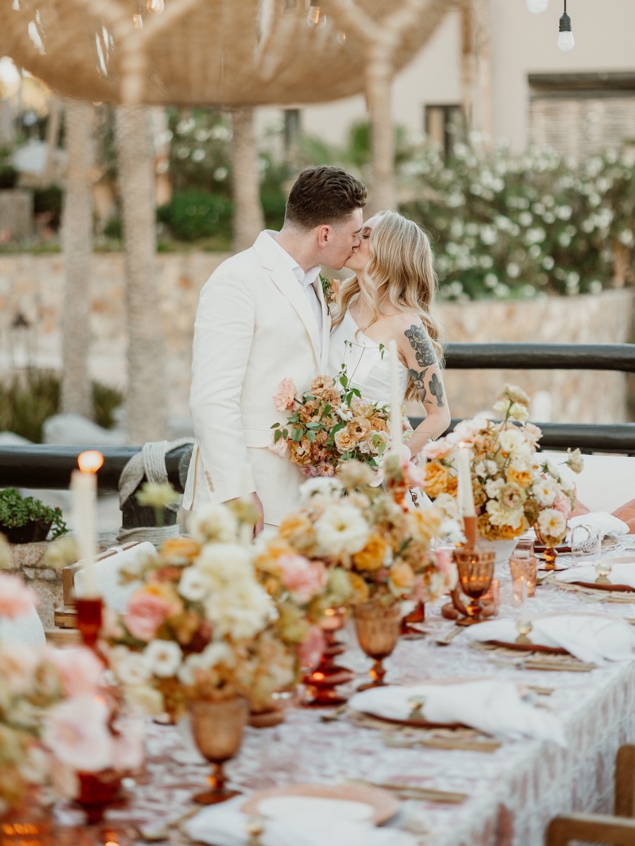 Chic boho wedding in Cabo with a reception inspired by amber glass