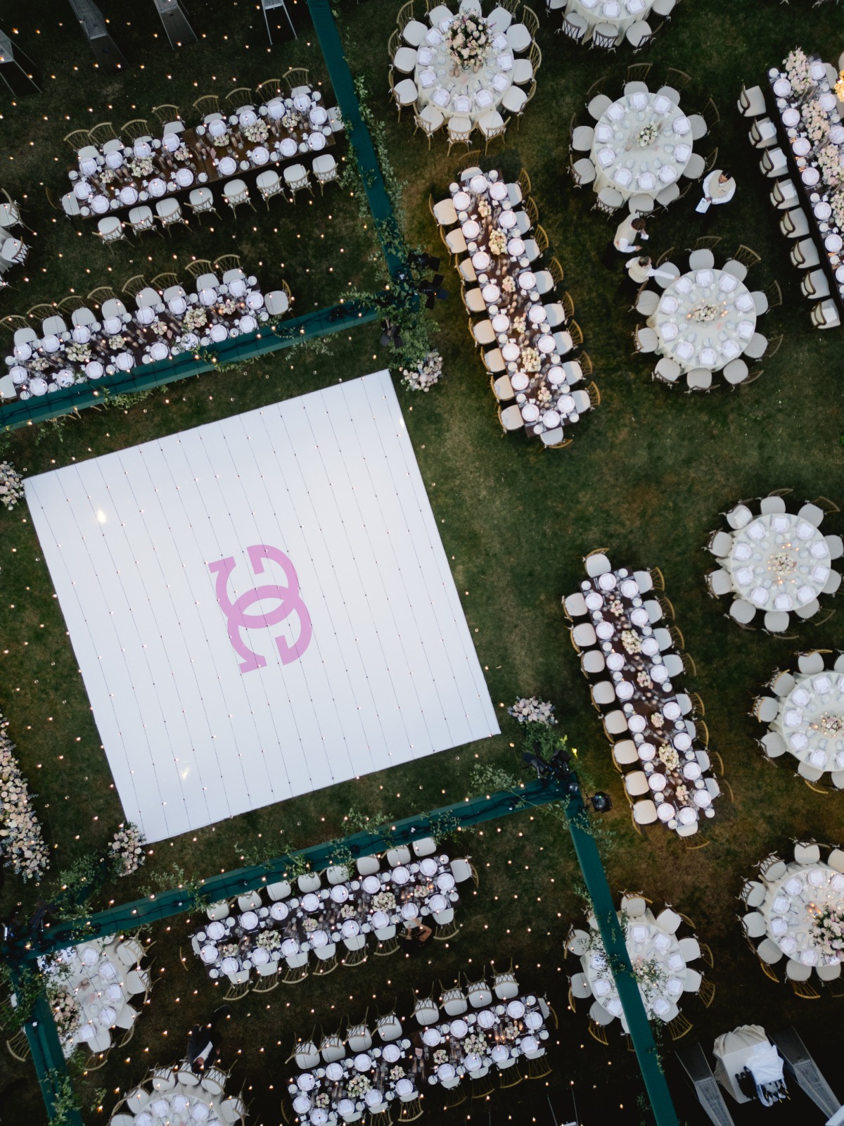 drone view of a wedding reception on the lawn
